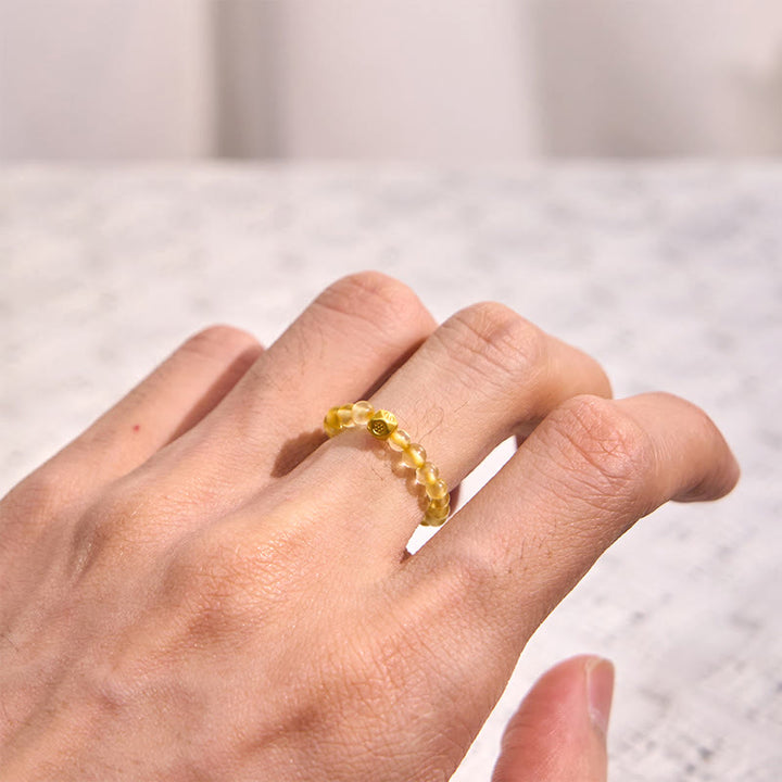 Anello elastico con perle di quarzo rutilato dorato da 3 mm Buddha Stones