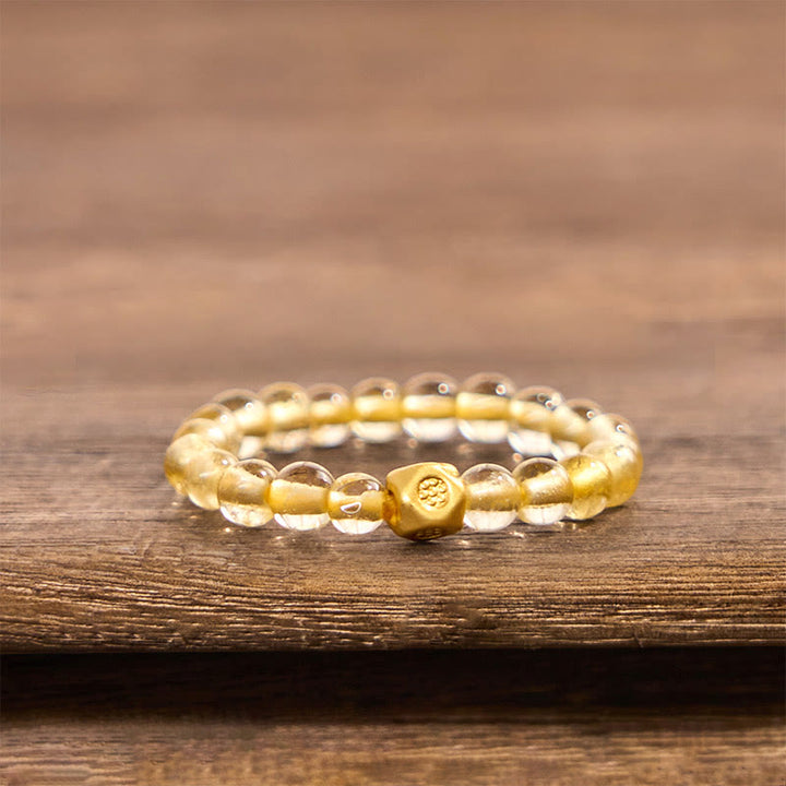 Anello elastico con perle di quarzo rutilato dorato da 3 mm Buddha Stones