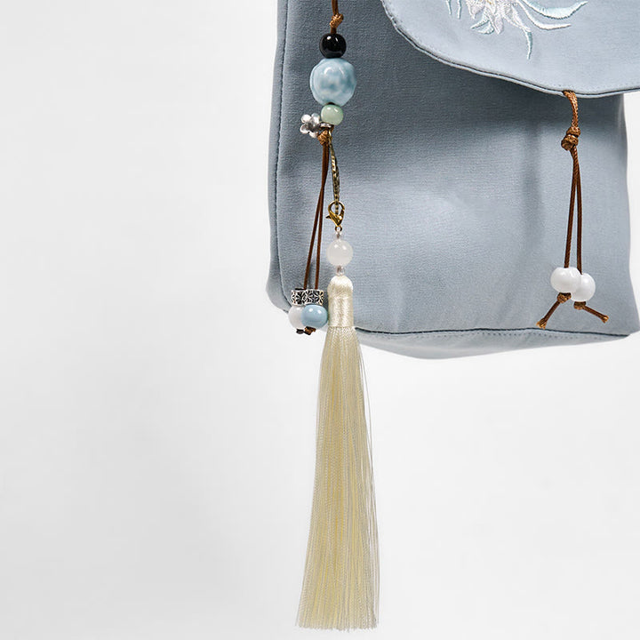Borsa a tracolla in cotone e lino Epiphyllum azzurro chiaro ricamata con Buddha Stones