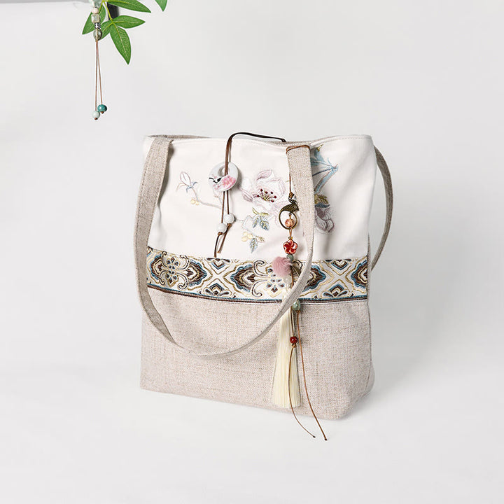 Borsa a tracolla in tela di poliestere con ricamo Buddha Stones Magnolia