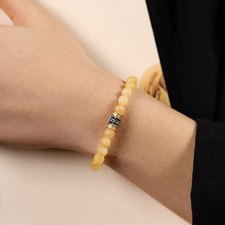 Bracciale della fortuna Buddha Stones e perle di topazio Om Mani Padme Hum