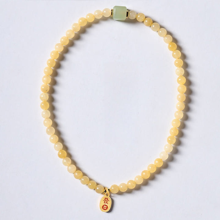 Bracciale della ricchezza con doppio cerchio, Buddha Stones di topazio e cubo di giada
