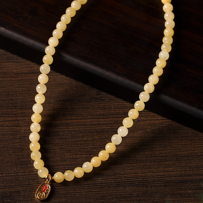 Bracciale della ricchezza con doppio cerchio, Buddha Stones di topazio e cubo di giada