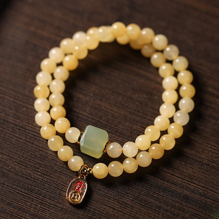 Bracciale della ricchezza con doppio cerchio, Buddha Stones di topazio e cubo di giada