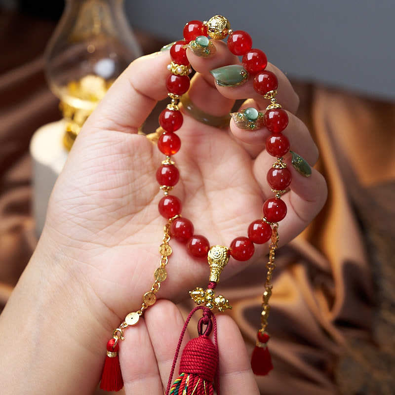 Buddha Stones 18 perle monete di rame nappa tibetana agata rossa mala da polso calmo