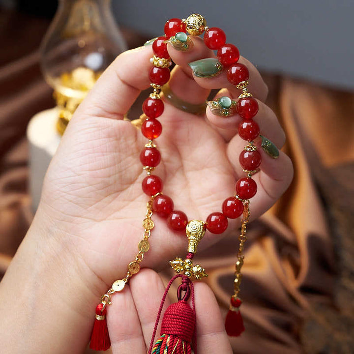 Buddha Stones 18 perle monete di rame nappa tibetana agata rossa mala da polso calmo