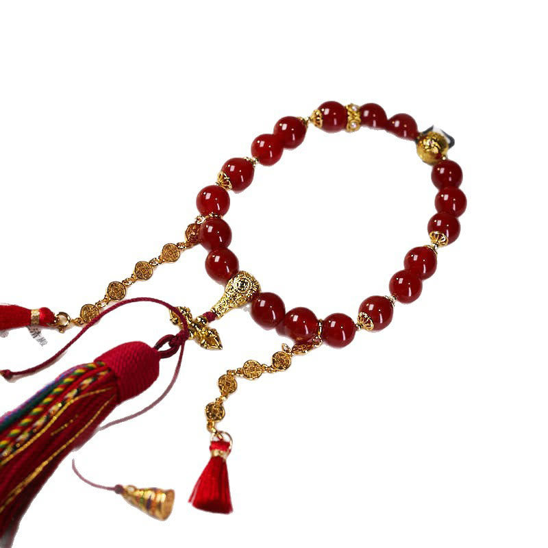 Buddha Stones 18 perle monete di rame nappa tibetana agata rossa mala da polso calmo