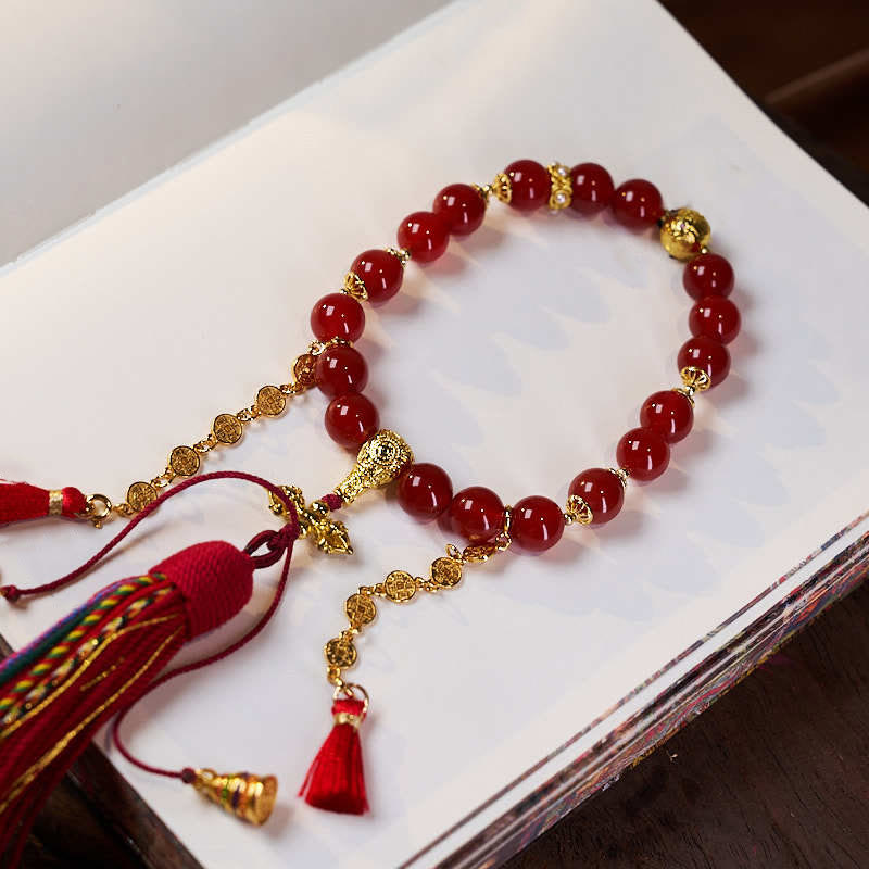 Buddha Stones 18 perle monete di rame nappa tibetana agata rossa mala da polso calmo