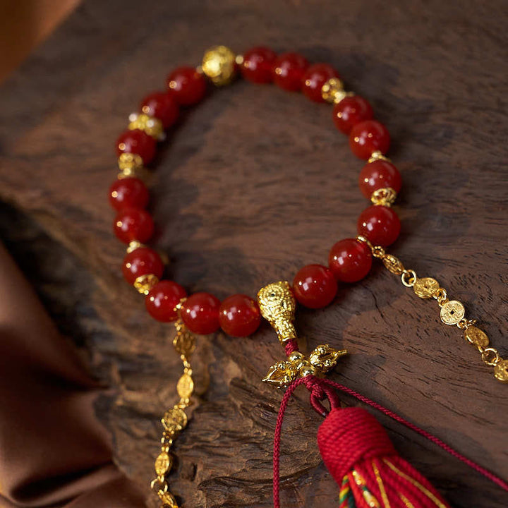 Buddha Stones 18 perle monete di rame nappa tibetana agata rossa mala da polso calmo