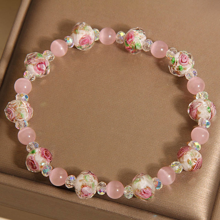 Braccialetto di calore con perline di vetro Liuli, cristallo rosa e Buddha Stones
