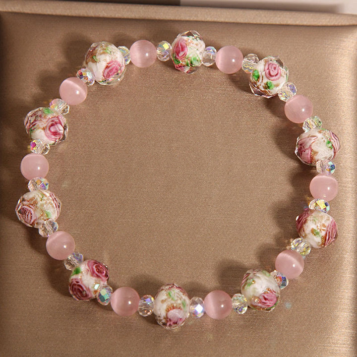 Braccialetto di calore con perline di vetro Liuli, cristallo rosa e Buddha Stones