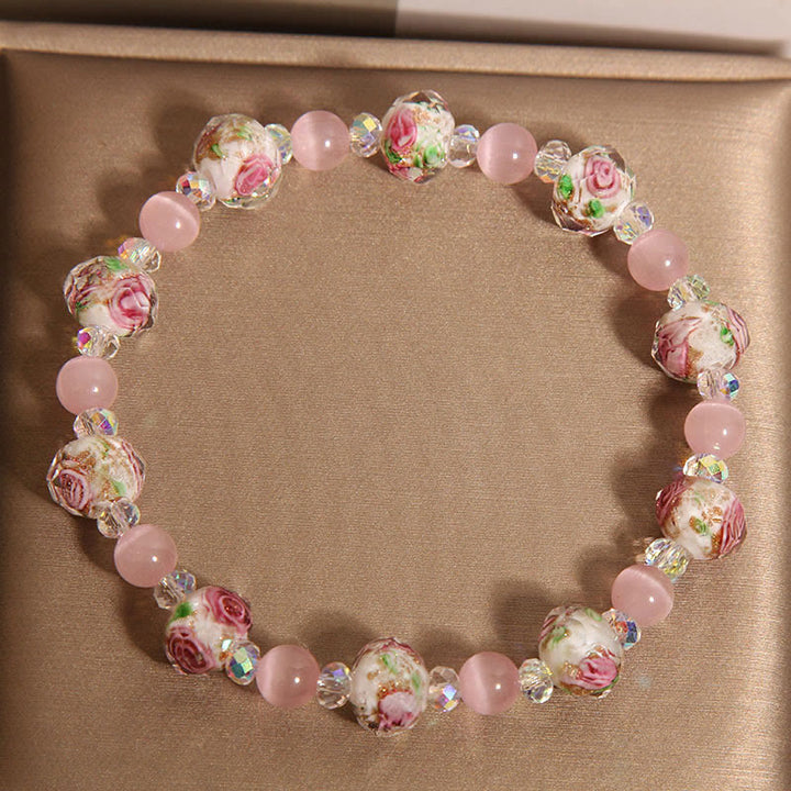 Braccialetto di calore con perline di vetro Liuli, cristallo rosa e Buddha Stones