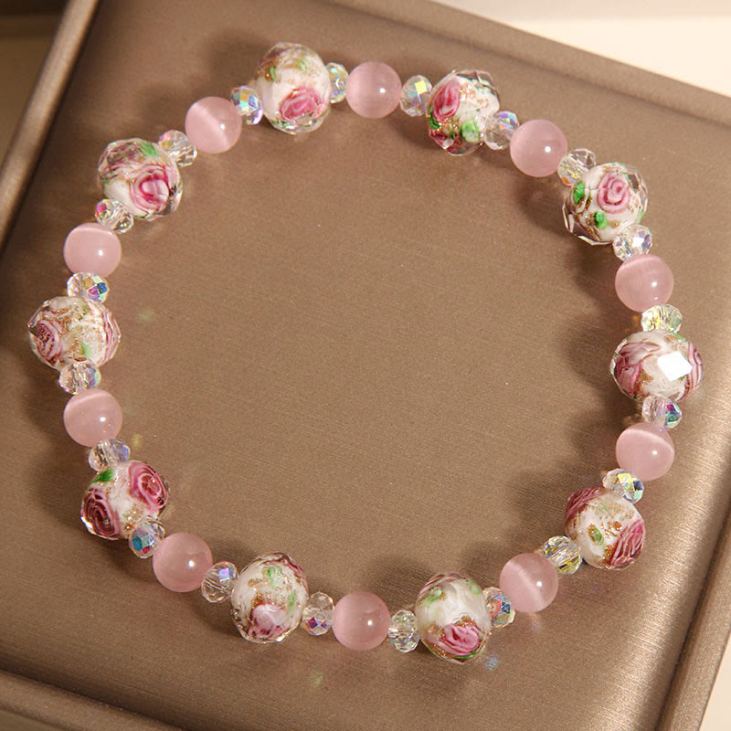 Braccialetto di calore con perline di vetro Liuli, cristallo rosa e Buddha Stones