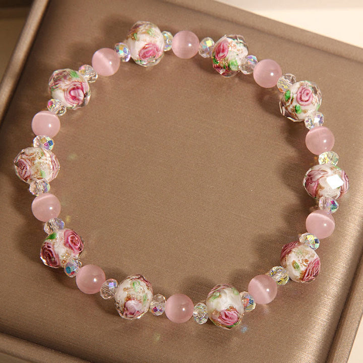 Braccialetto di calore con perline di vetro Liuli, cristallo rosa e Buddha Stones
