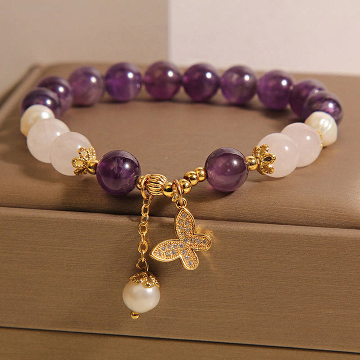 Bracciale con ciondolo a farfalla in cristallo di perla e ametista naturale Buddha Stones