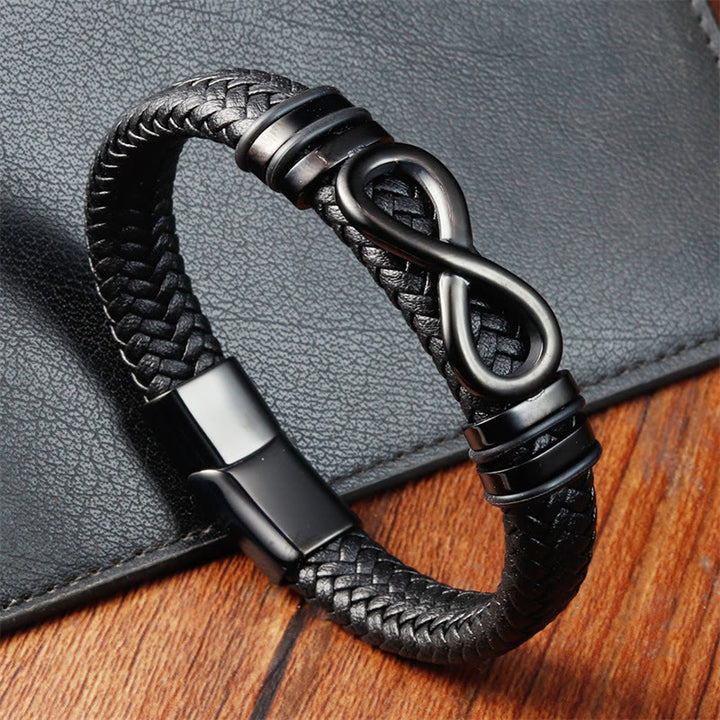 Bracciale con fibbia in pelle intrecciata rinforzata in acciaio al titanio con design a nodo infinito Buddha Stones