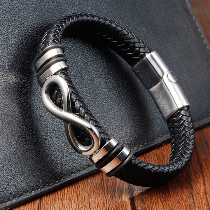 Bracciale con fibbia in pelle intrecciata rinforzata in acciaio al titanio con design a nodo infinito Buddha Stones