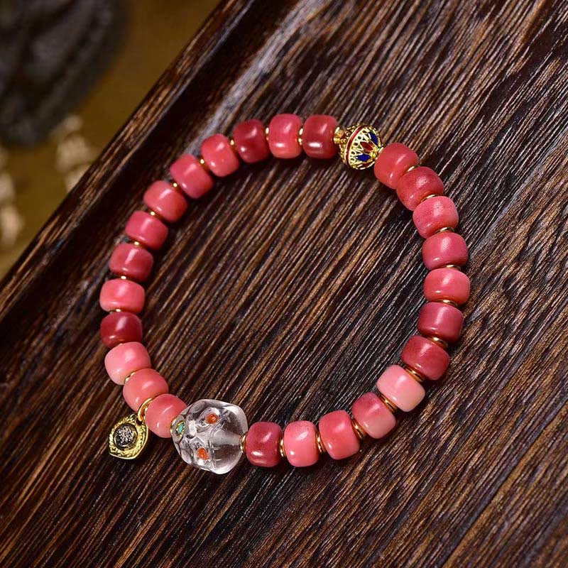 Braccialetto della fortuna in agata rossa e rame con osso di cammello tibetano Buddha Stones
