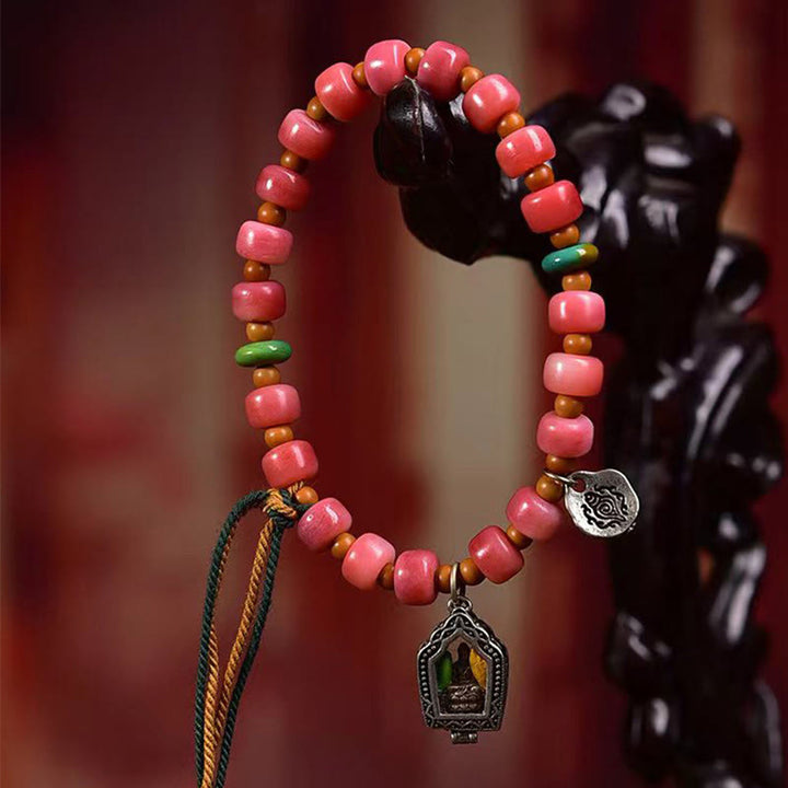 Braccialetto della fortuna in agata rossa e rame con osso di cammello tibetano Buddha Stones