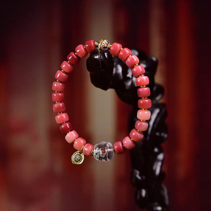 Braccialetto della fortuna in agata rossa e rame con osso di cammello tibetano Buddha Stones