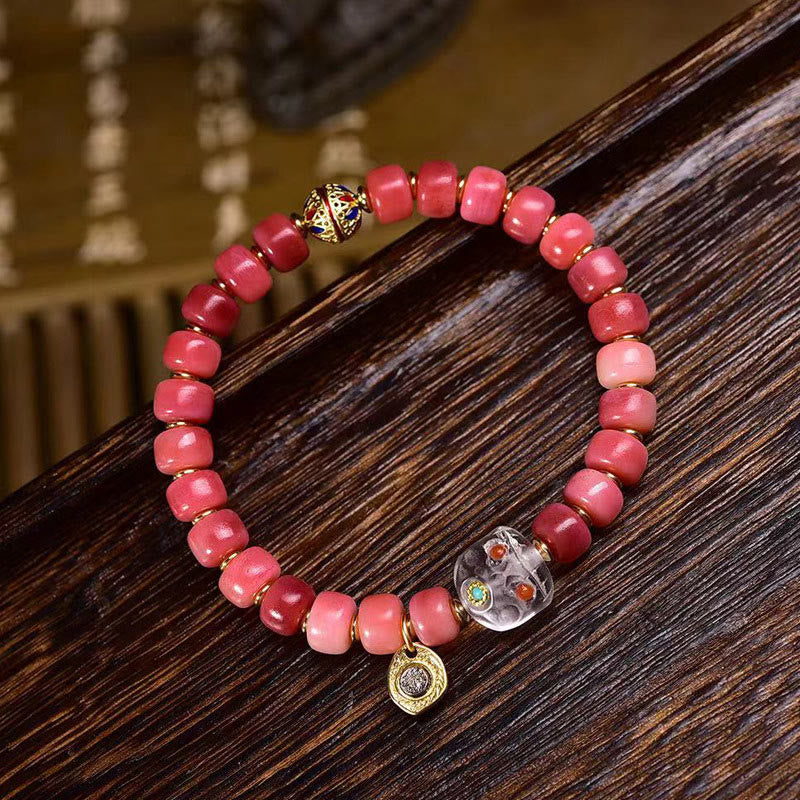 Braccialetto della fortuna in agata rossa e rame con osso di cammello tibetano Buddha Stones