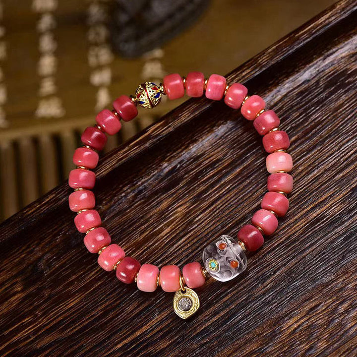 Braccialetto della fortuna in agata rossa e rame con osso di cammello tibetano Buddha Stones