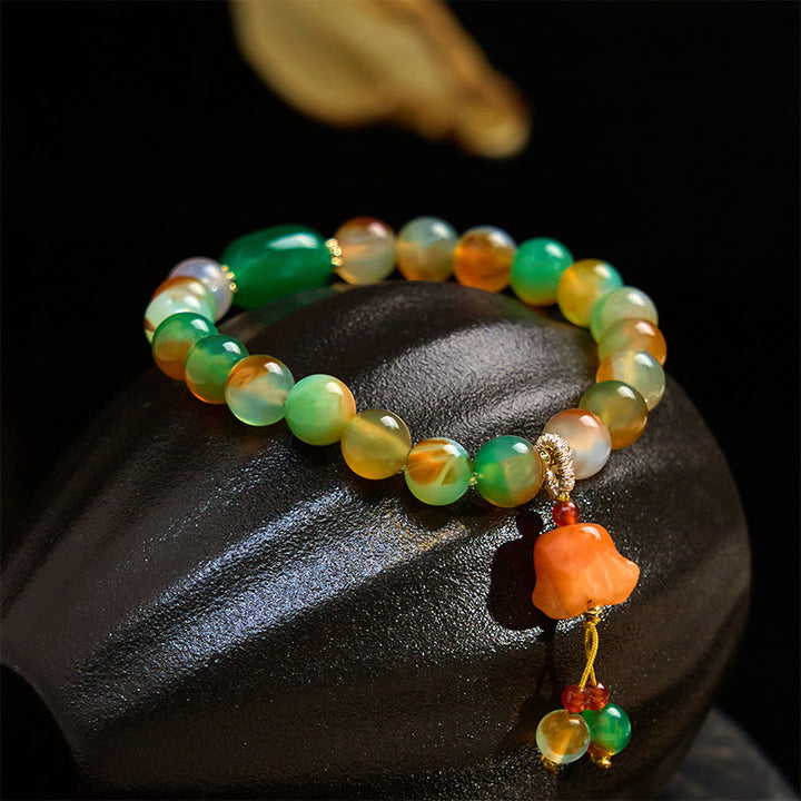 Braccialetto di supporto con fibbia della pace a farfalla, mughetto, agata pavone colorata naturale di Buddha Stones