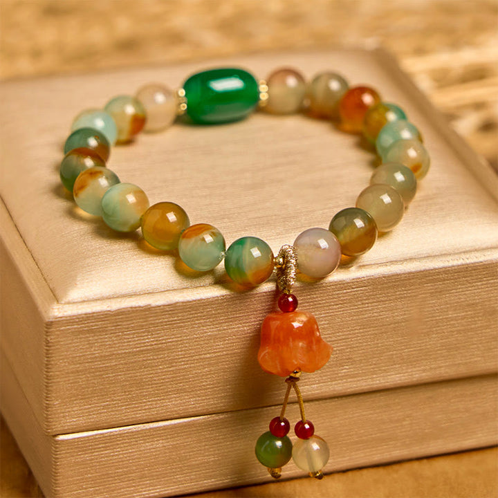 Braccialetto di supporto con fibbia della pace a farfalla, mughetto, agata pavone colorata naturale di Buddha Stones