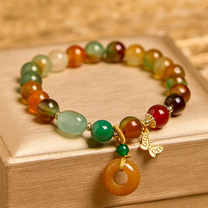 Braccialetto di supporto con fibbia della pace a farfalla, mughetto, agata pavone colorata naturale di Buddha Stones
