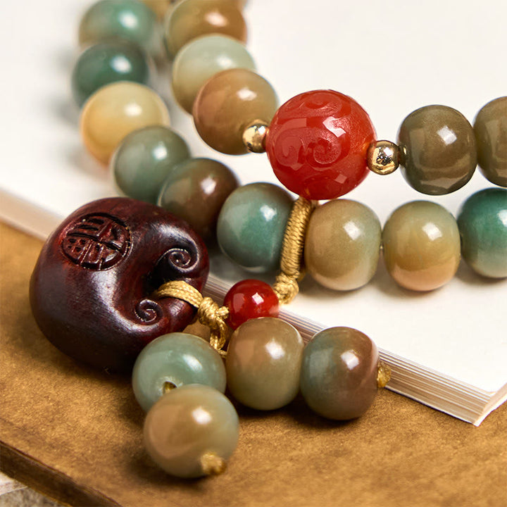 Bracciale doppio giro con semi di Bodhi colorati Buddha Stones