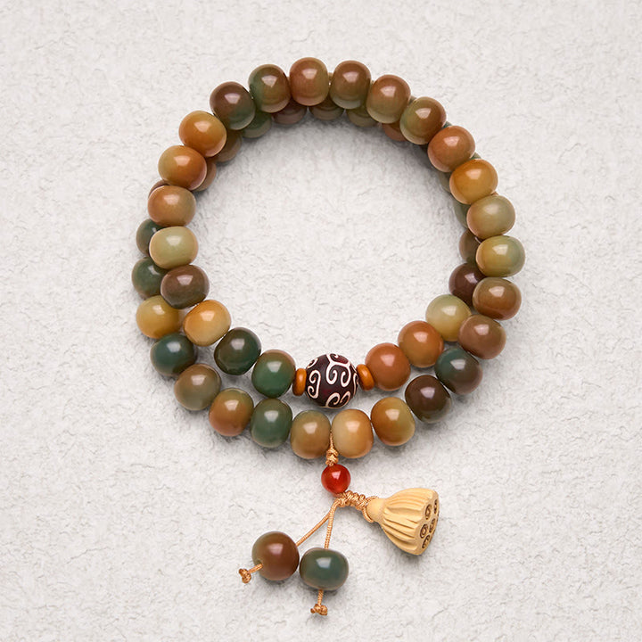 Bracciale doppio giro con ciondolo a forma di baccello di loto con semi di Bodhi colorati Buddha Stones