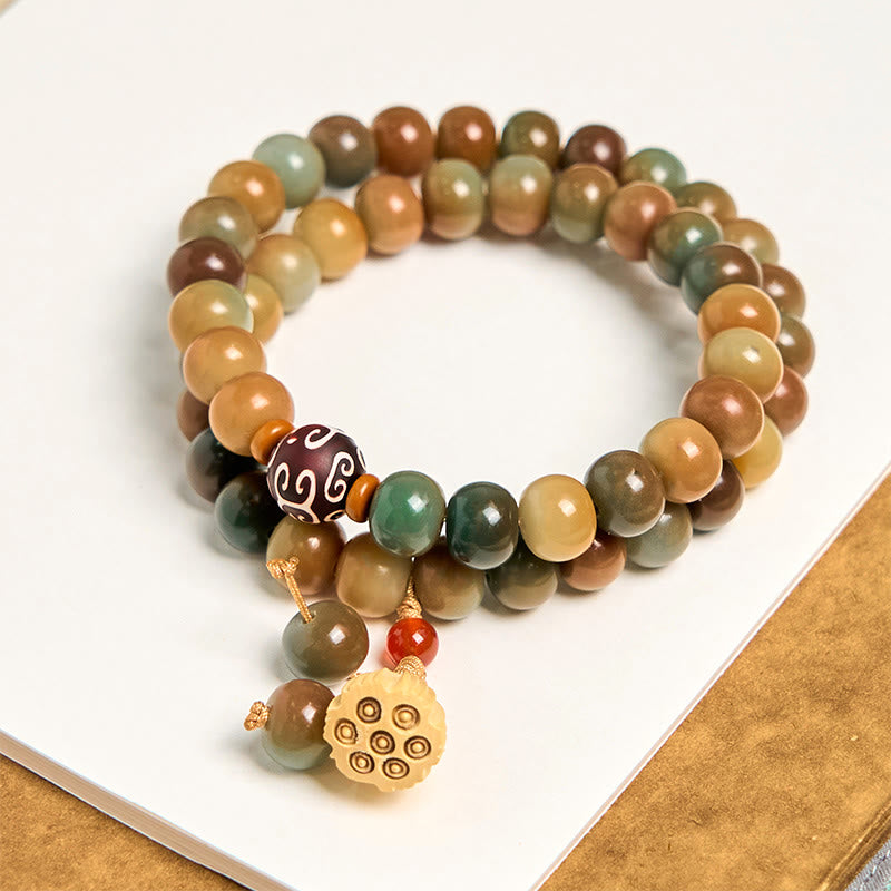 Bracciale doppio giro con ciondolo a forma di baccello di loto con semi di Bodhi colorati Buddha Stones