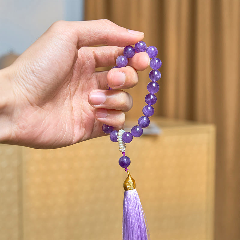 Bracciale da meditazione con nappe e perle di ametista naturale Buddha Stones
