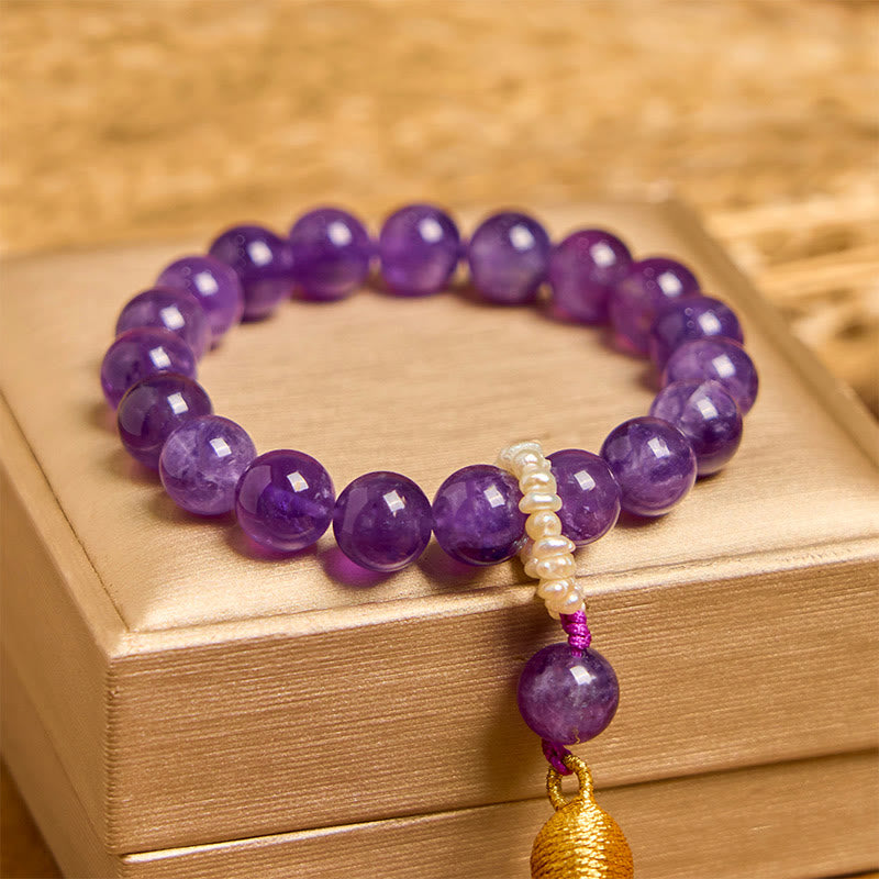 Bracciale da meditazione con nappe e perle di ametista naturale Buddha Stones