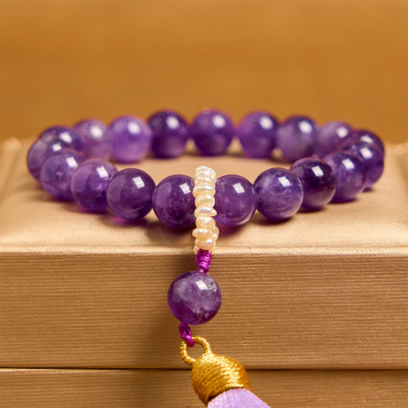 Bracciale da meditazione con nappe e perle di ametista naturale Buddha Stones