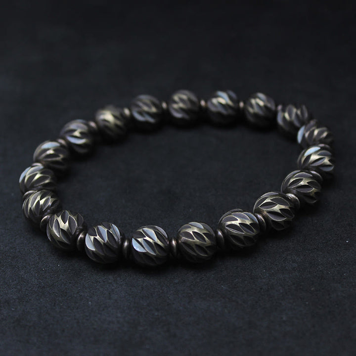 Braccialetto della ricchezza con perline di ottone e rame, motivo a coltello anticato , Buddha Stones