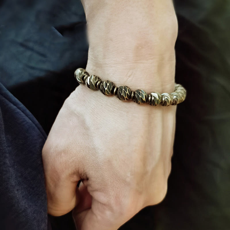 Braccialetto della ricchezza con perline di ottone e rame, motivo a coltello anticato , Buddha Stones