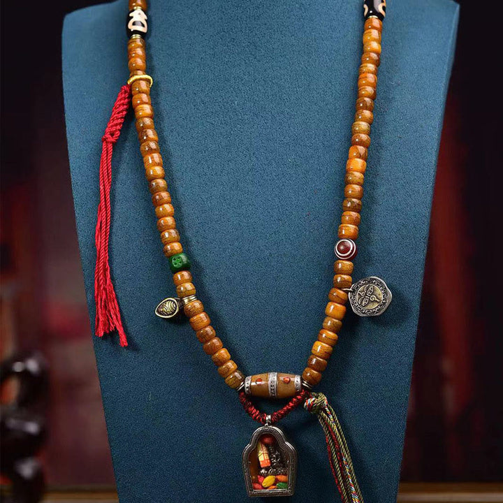 Buddha Stones Tibetano 108 Perle Osso di Cammello Fortuna Nappa Mala