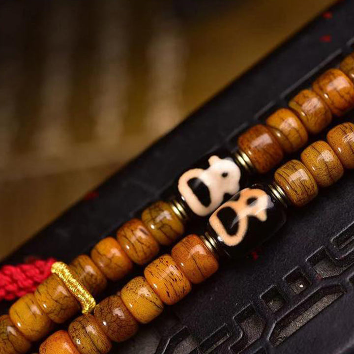 Buddha Stones Tibetano 108 Perle Osso di Cammello Fortuna Nappa Mala