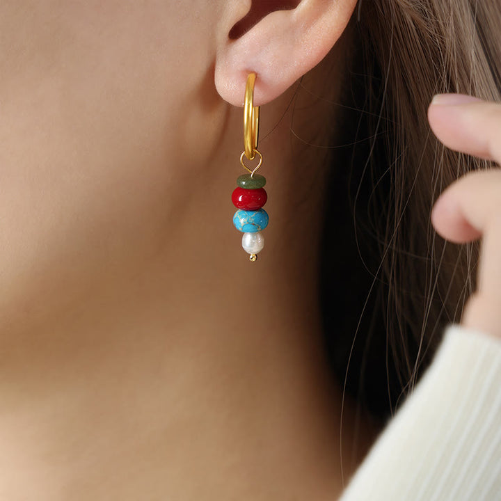 Orecchini in acciaio al titanio con perle di agata rossa naturale, design in pietra tibetana Marnyi di Buddha Stones