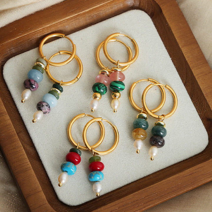 Orecchini in acciaio al titanio con perle di agata rossa naturale, design in pietra tibetana Marnyi di Buddha Stones