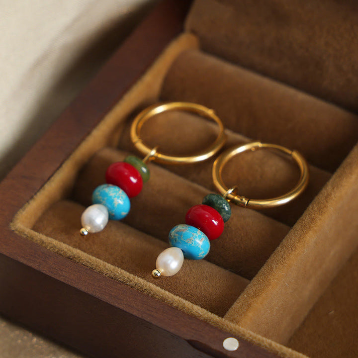 Orecchini in acciaio al titanio con perle di agata rossa naturale, design in pietra tibetana Marnyi di Buddha Stones