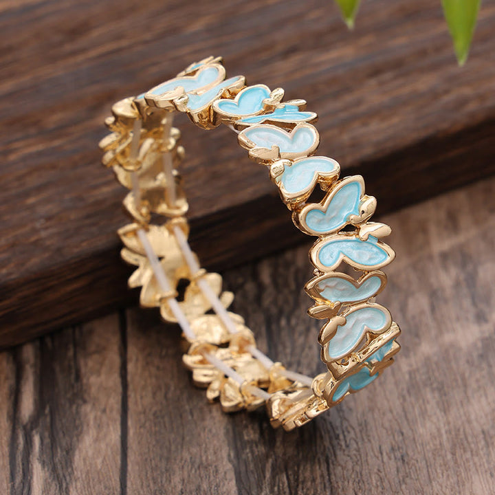 Bracciale elastico in lega con farfalla colorata Buddha Stones