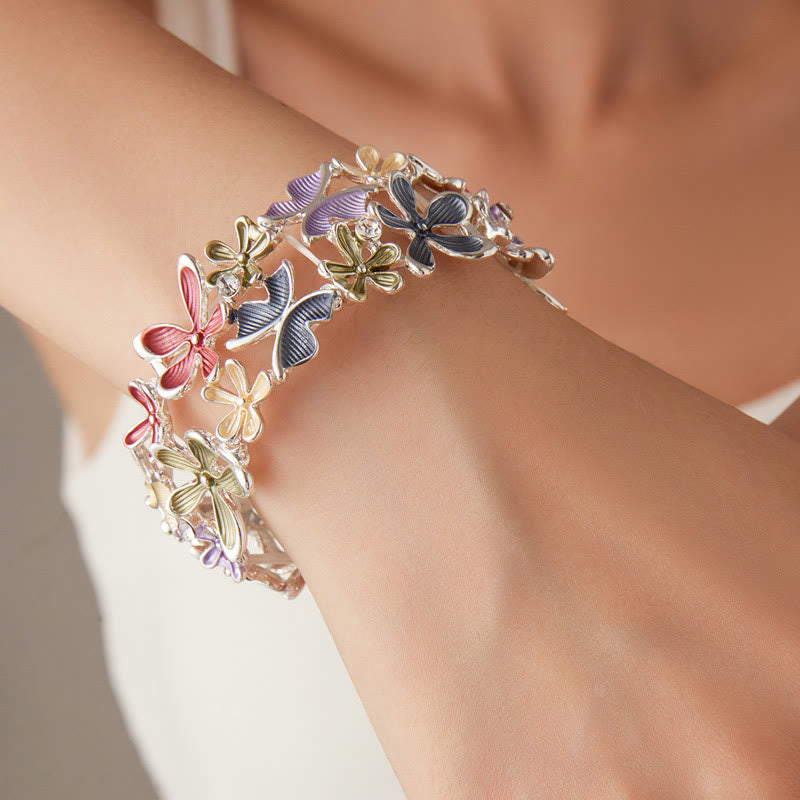 Bracciale elastico in lega con Buddha Stones, farfalle colorate e fiori