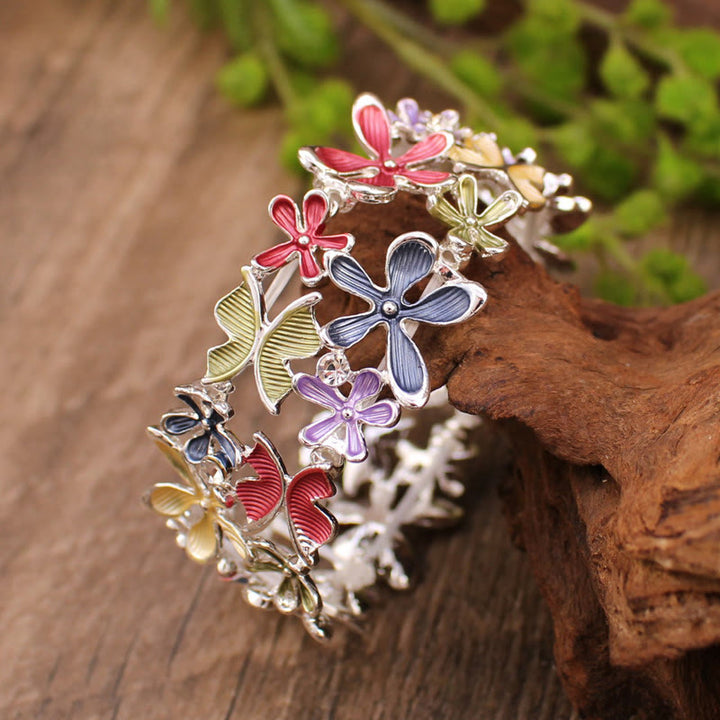 Bracciale elastico in lega con Buddha Stones, farfalle colorate e fiori