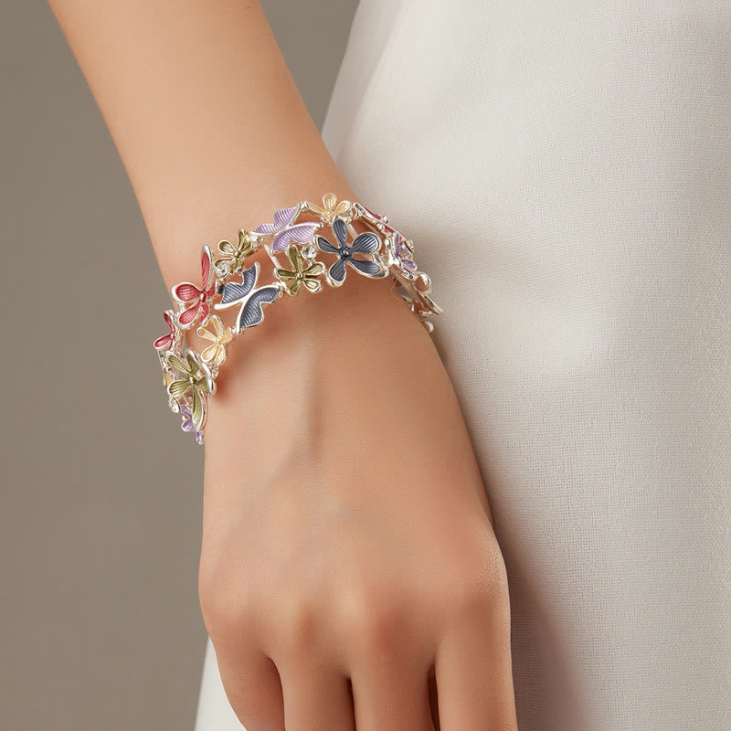 Bracciale elastico in lega con Buddha Stones, farfalle colorate e fiori