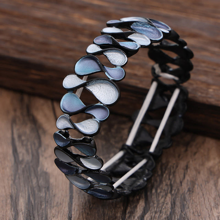 Bracciale elastico in lega a forma di 8 Buddha Stones colorate e cavo geometrico