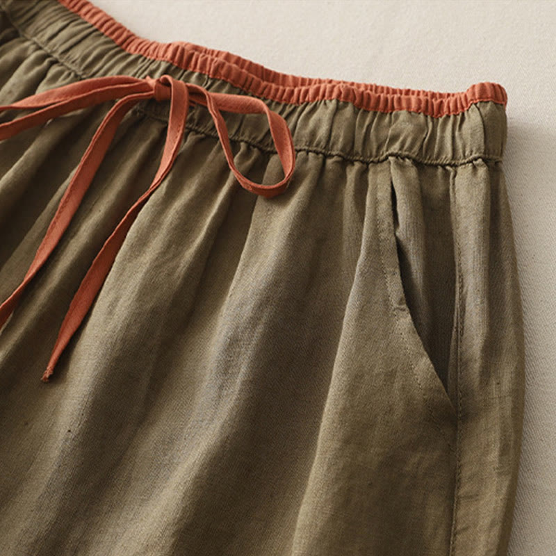 Pantaloni da donna a gamba larga con coulisse e tasche, modello casual color block con motivo Buddha Stones. - image 1