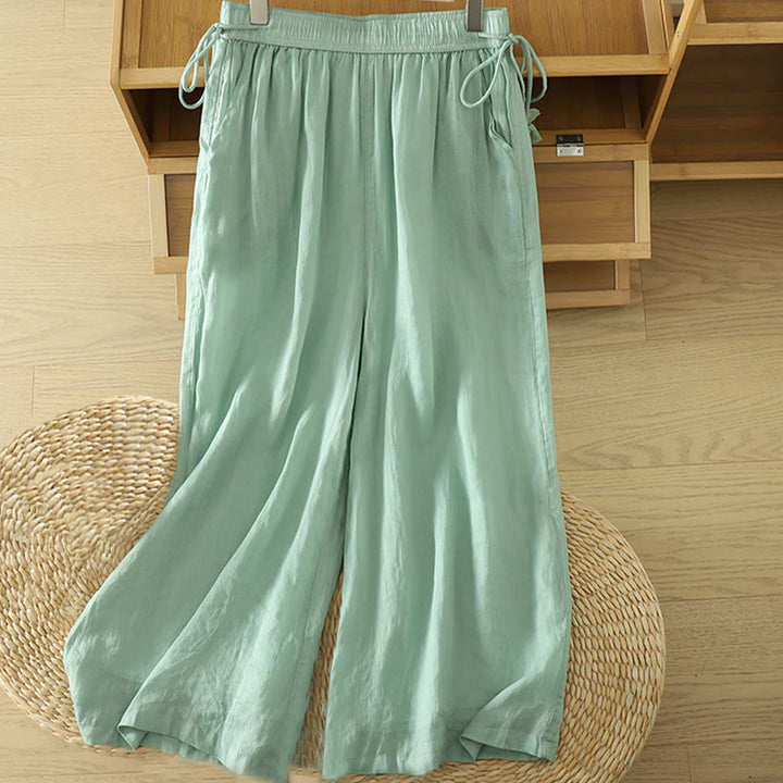 Pantaloni larghi da donna in poliestere con tasche, foderati in tinta unita e elasticizzati, modello Buddha Stones