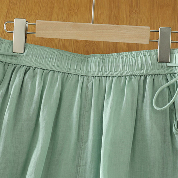 Pantaloni larghi da donna in poliestere con tasche, foderati in tinta unita e elasticizzati, modello Buddha Stones